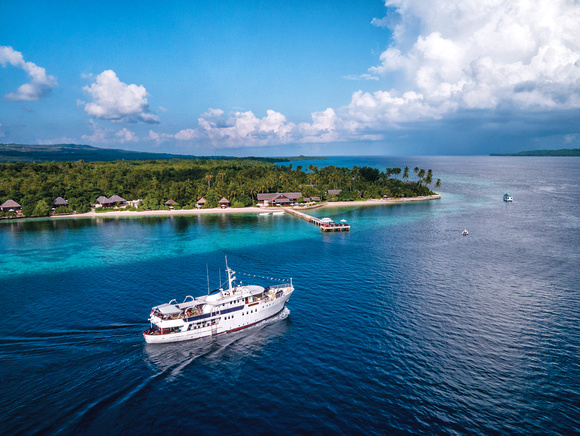 Pelagian dive yacht passes Wakatobi Resort