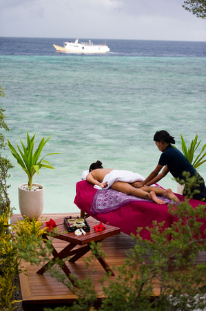 Massage on Wakatobi Villa deck as Pelagian passes by
