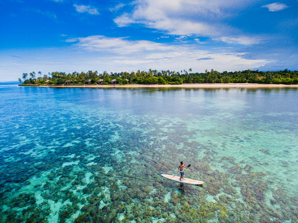 Paddleboarding on House Reef
